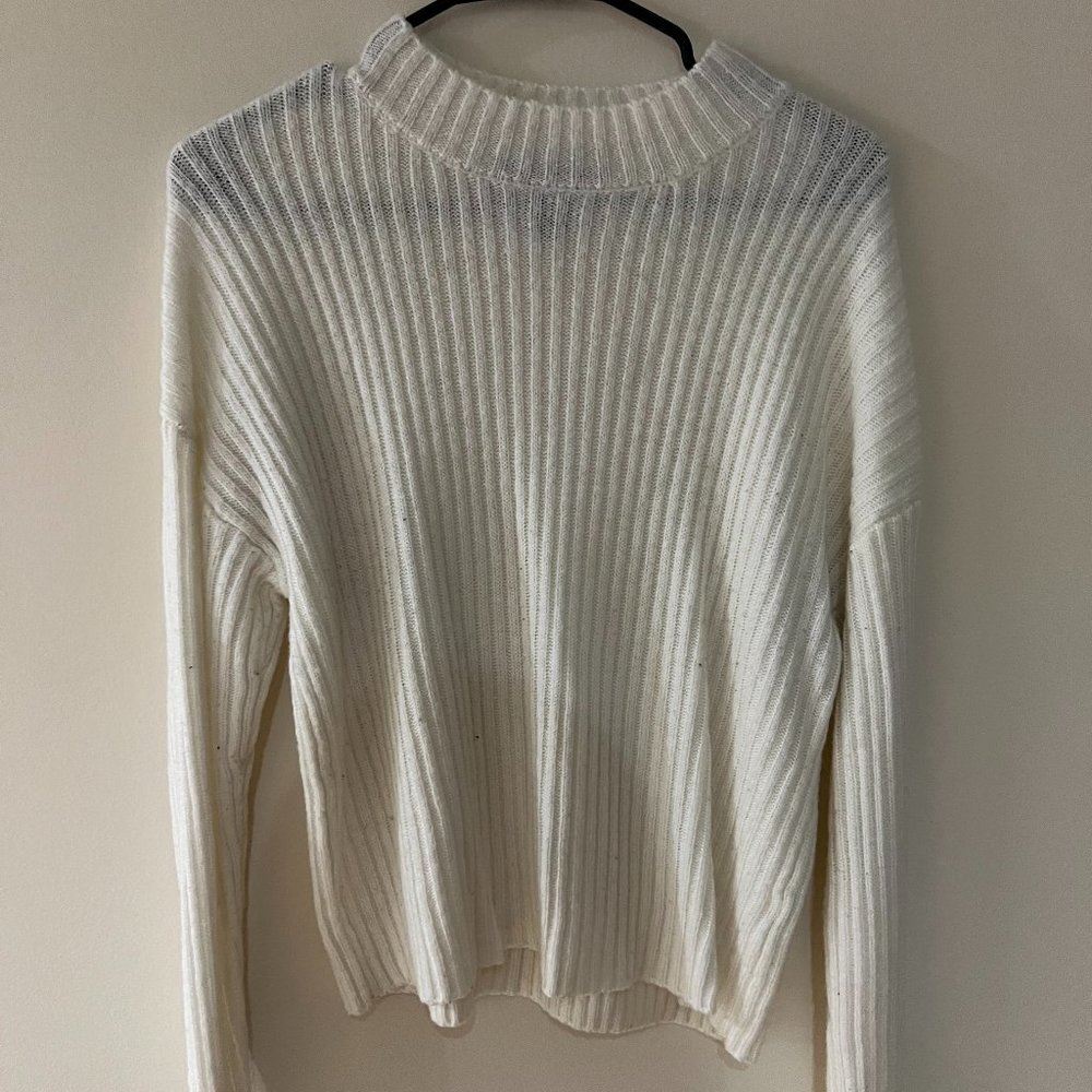 White ribbed mock neck sweater